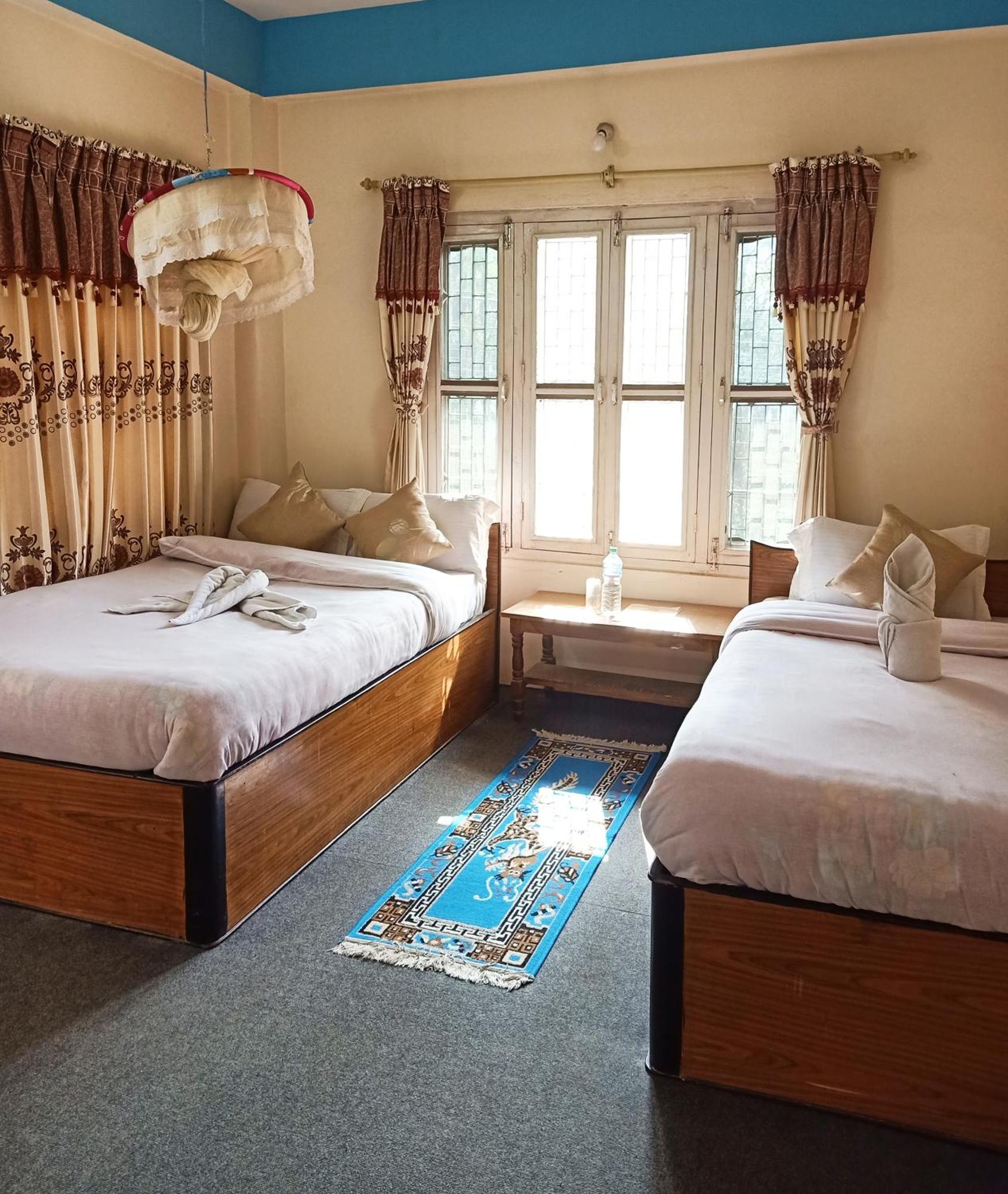 Hotel Rhinoceros-Homestay Sauraha Habitación foto